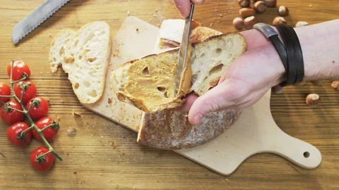 Buttering Bread With Peanut Butter Stock Footage 70569468