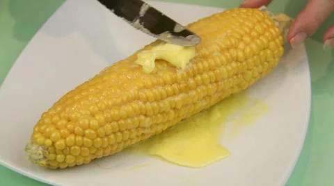 Buttering Corn with Butter Melting Stock Footage 55186490