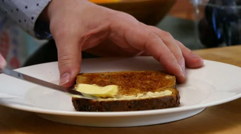 Buttering toast Stock Footage 49622990