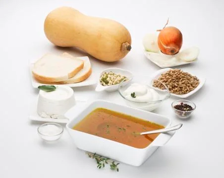 Butternut squash Cucurbita moschata with various ingredients isolated on whit Foto stock