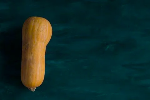 A butternut squash in a light blue table Foto stock