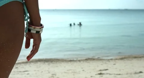 Buttocks of a Woman in a Bikini Stock Footage 61157983