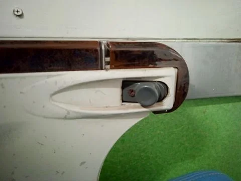 Button for adjusting the passenger seat of the train Stock Photos