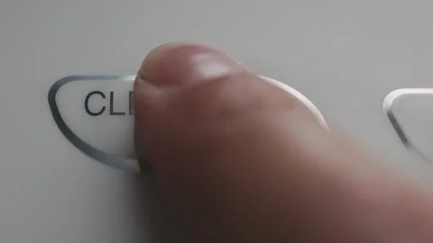 Button of air purifier. A female press the button on the air purifier in the Stock Footage 202264990