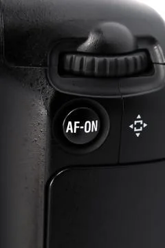 Button and joystick on the camera battery grip Stock Photos