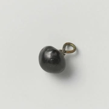 Button from black glass or git. Button from black glass or git. Copyright:... Stockfoto's