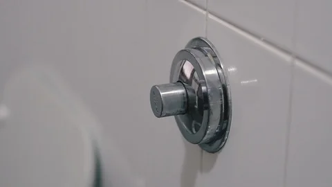Button. Button for draining the toilet. Stock Footage 123570458