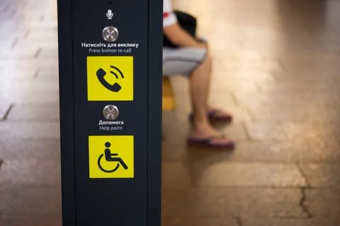 Button for calling staff to help people with disabilities and wheelchairs Stock Photos