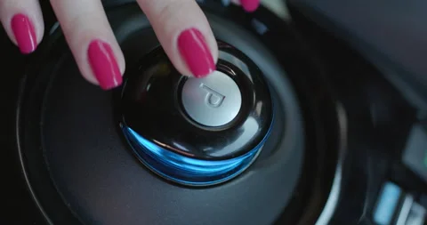 Button Of Car Parking. The driver in the car presses the auto parking button Stock Footage 194492227