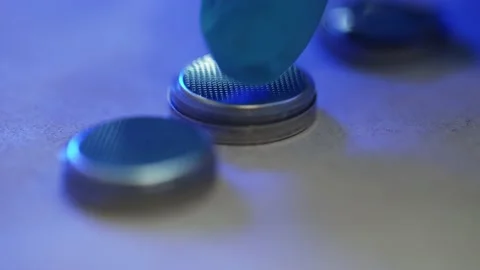 Button Cell Battery being put together Stock Footage 160257760