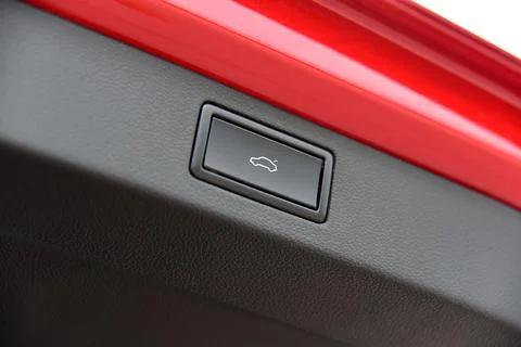 Button for closing the car trunk Stock Photos