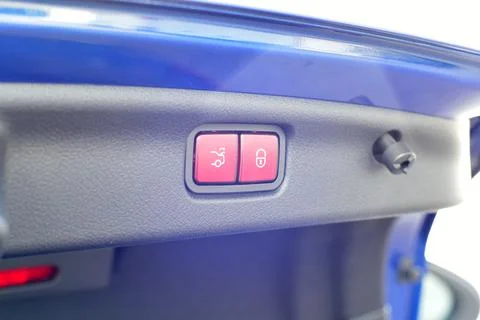 Button for closing the car trunk Stock Photos