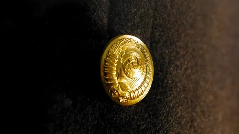 Button on clothes with the coat of arms of the Soviet Union. Close up shot Stock Footage 279085135