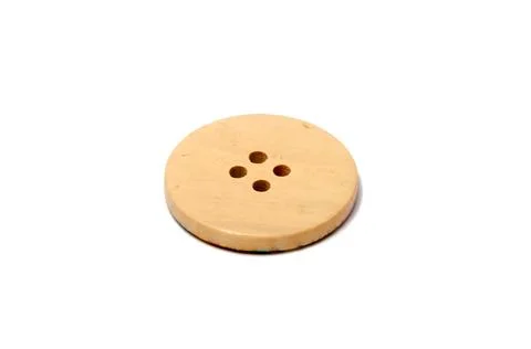 Button for clothes isolated on the white Stock Photos
