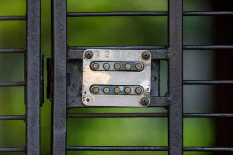 Button code lock on the gate Stock Photos