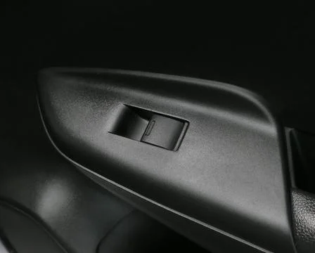 Button controlling open and close window in car Photos