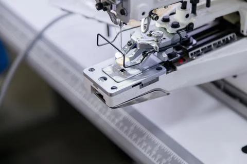 Button on electric sewing machine Stock Photos