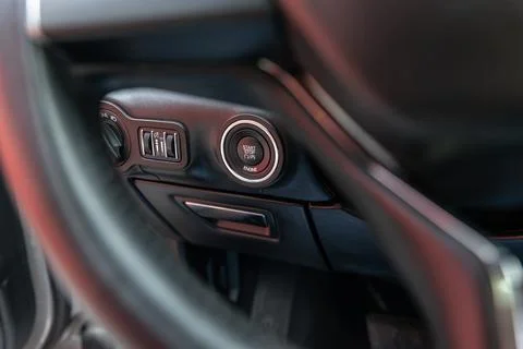 Button engine start and engine stop. Car inside. Ignition remote starter. Mod Stock Photos