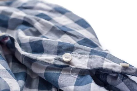 Button getting to come off the shirt Stock Photos