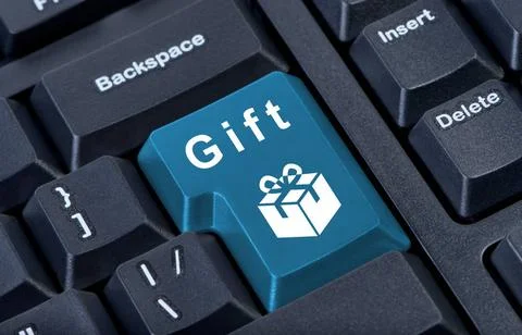 Button keypad with gift box icon. Button keypad with gift box icon. Intern... Stock Photos