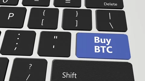 Button on laptop keyboard buy bitcoin. Close up of BUY and SELL button in online Stock Footage 302187637