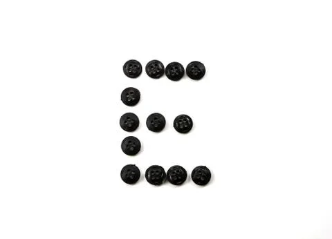 Button letter Stock Photos