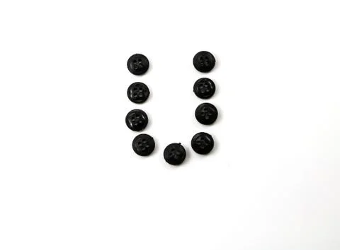 Button letter Stock Photos