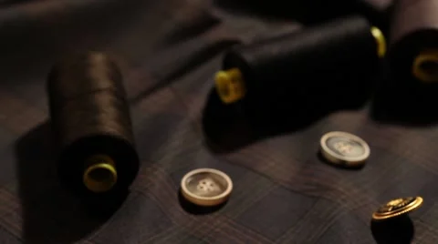 Button needle and thread Stock Footage 43168336