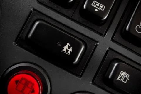 Button to open door on school bus Foto stock