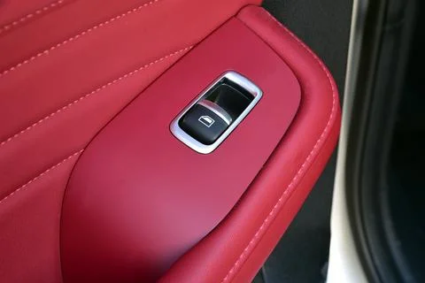 The button for raising the windows in the car Stock Photos