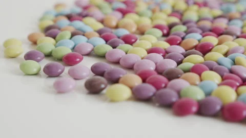 Button shaped dragee filled with chocolate 4K video Video stock 152800080