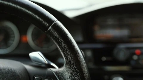 Button on the steering wheel of the car, speakerphone and cruise control. Stock Footage 104341383