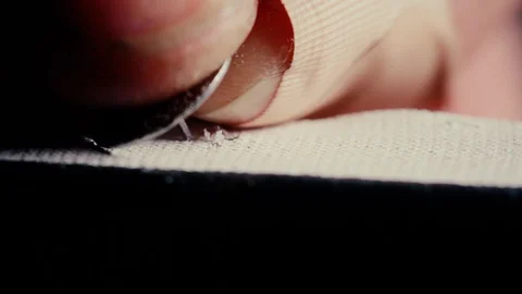 Button sticks into the canvas Stock Footage 128187618