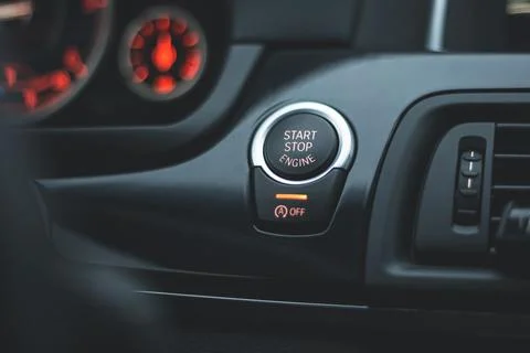The button for stopping the start of the car engine. Stock Photos