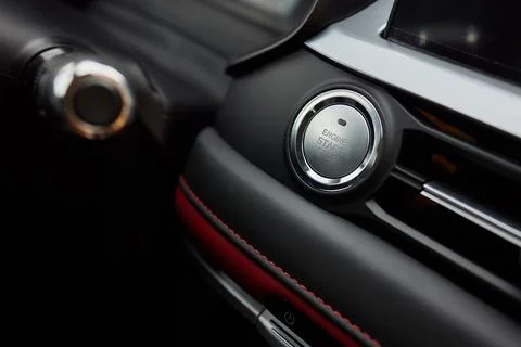The button for stopping the start of the car engine. Stock Photos