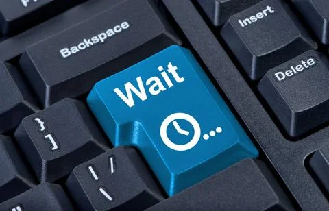 Button wait computer keyboard with clock icon. Button wait computer keyboa... Stock Photos