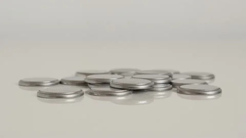 Button watch batteries close-up slow tilt 4K video Stock Footage 98982619