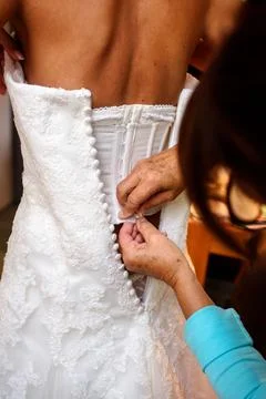 Button up a wedding dress Stock Photos