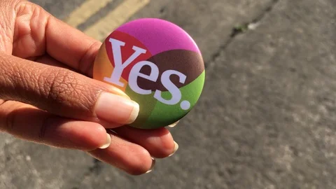A Button with "Yes" for Irish abortion referendum, Dublin, Ireland - 2018 Stock Footage 90234887