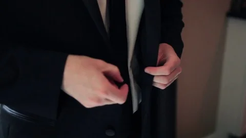 Buttoning Suit Jacket Stock Footage 71588926