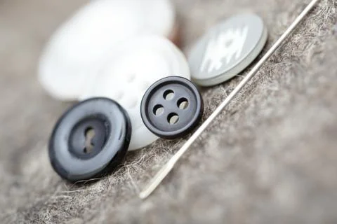 Buttons and needle Stock Photos