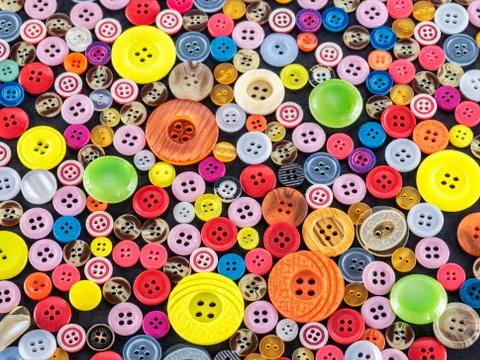 Buttons on black background Stock Photos