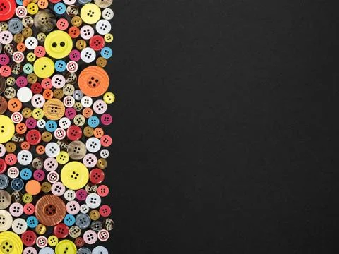 Buttons on black background Stock Photos