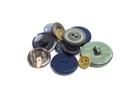 Buttons for clothes on white background using for concept of Button Day. Stock Photos