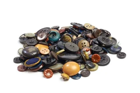 Buttons for clothes on white background using for concept of Button Day. Stock Photos