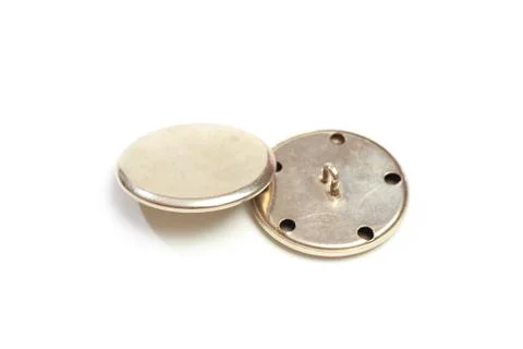 Buttons for clothes on white background using for concept of Button Day. Stock Photos