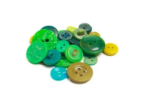 Buttons for clothes on white background using for concept of Button Day. Stock Photos