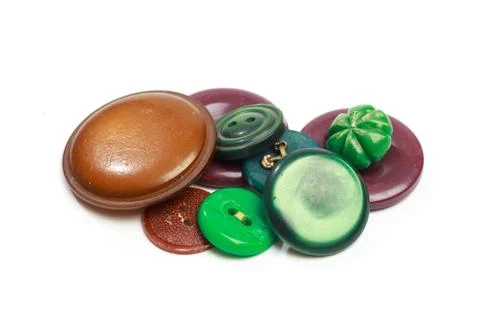 Buttons for clothes on white background using for concept of Button Day. Stock Photos