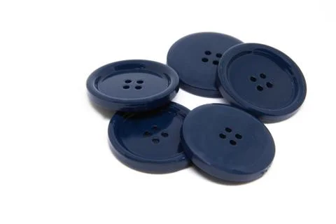 Buttons for clothes on white background using for concept of Button Day. Stock Photos