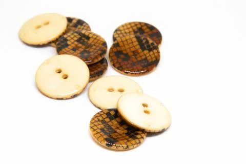 Buttons for clothes on white background using for concept of Button Day. Stock Photos